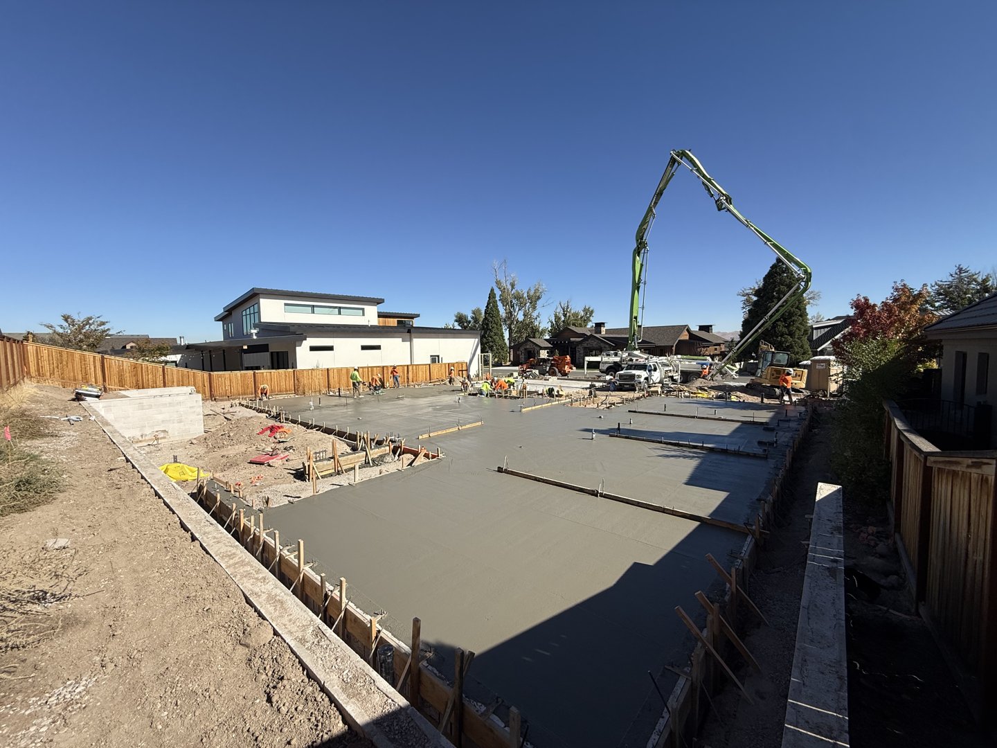 Placed slab across the building footprint with the pump at the far end