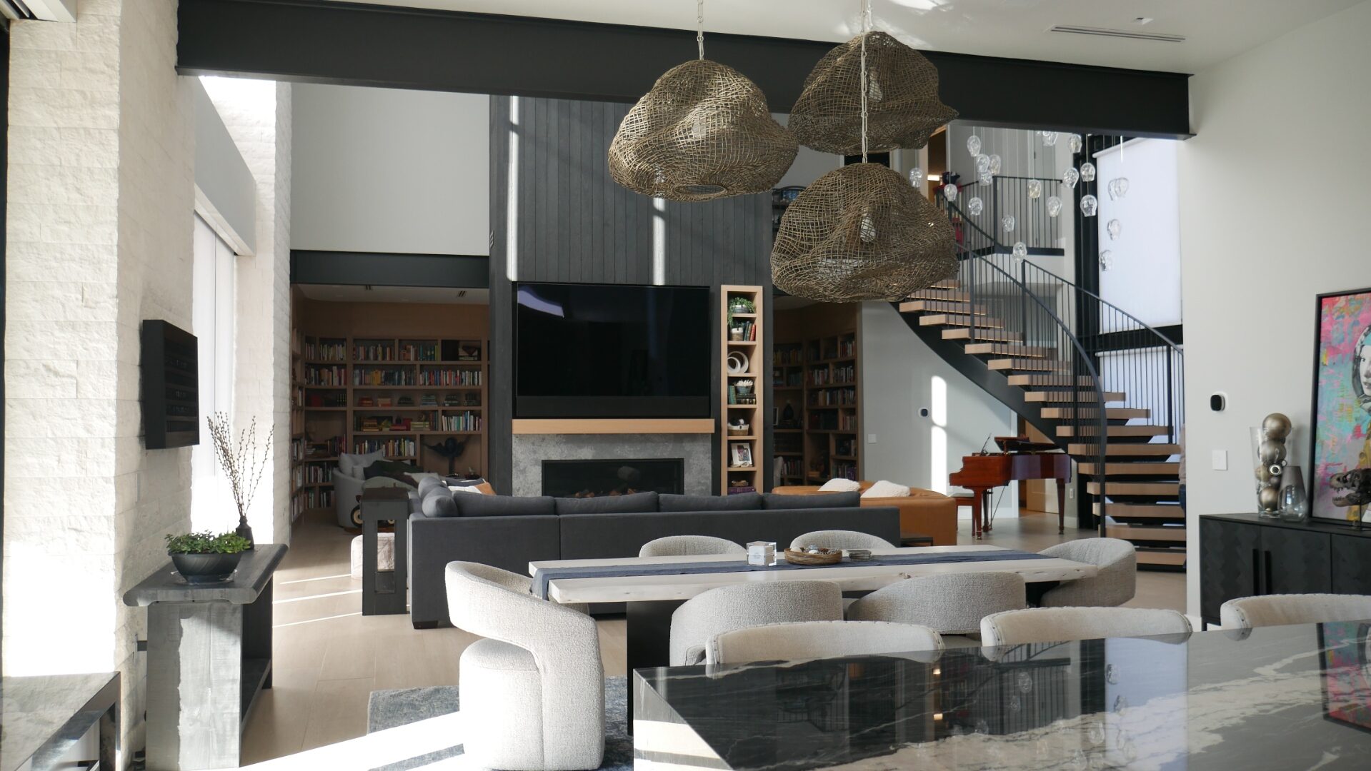 Contemporary great room with library