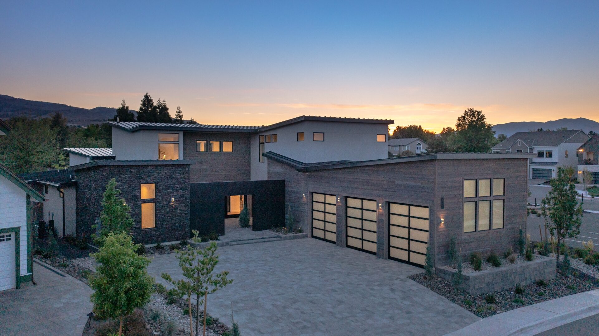 Custom Reno home at dusk with Sierra sunset