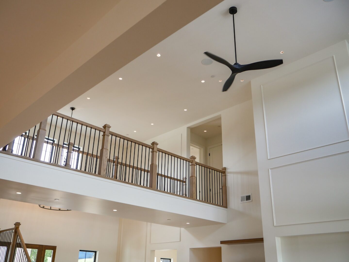 Great room fireplace and open catwalk above