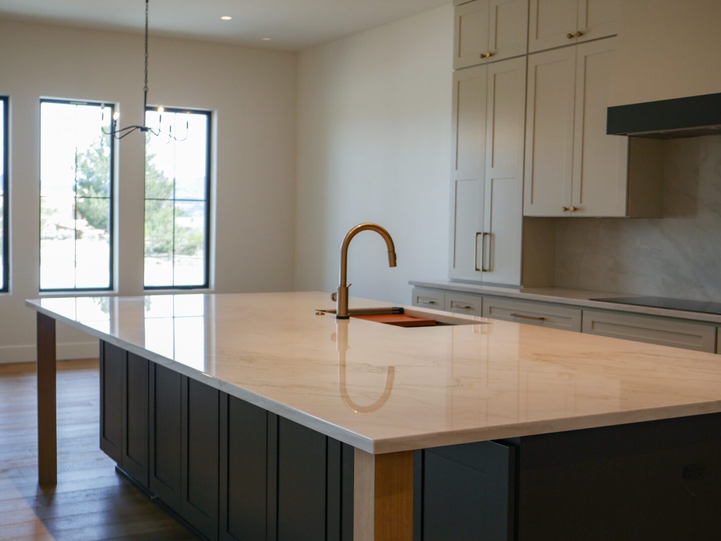 Kitchen detail — brushed brass fixtures