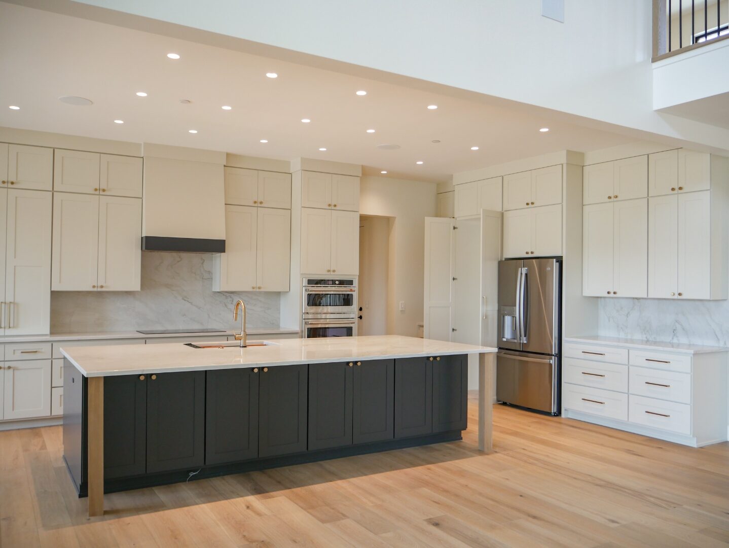 Kitchen island with marble waterfall edge